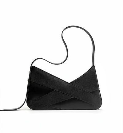 The black Lulu handbag in italian leather from Studio DRÈA that was featured in Marie Claire France shopping list against a white background.